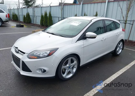 2012 Ford Focus Titanium z USA, uszkodzony, nr VIN 1FAHP3N23CL382480